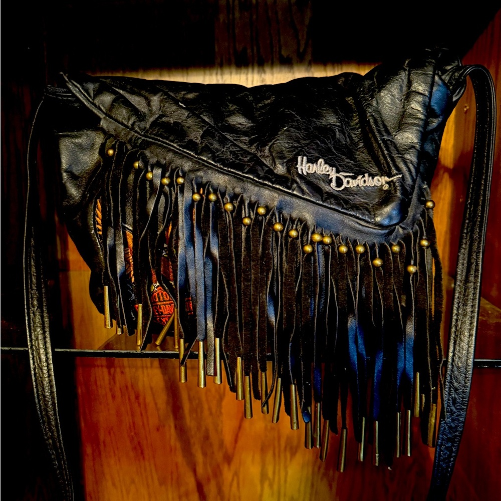 Genuine Harley Davidson Leather Purse with brass bugles and beads on the fringe.